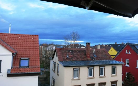 Blick aus Dachfenster über Nachbarhäuser